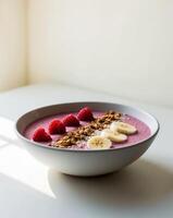 Delicious Raspberry Smoothie Bowl with Banana and Granola. photo