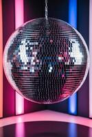 Disco ball with colorful light backdrop for vibrant event promotion design. photo