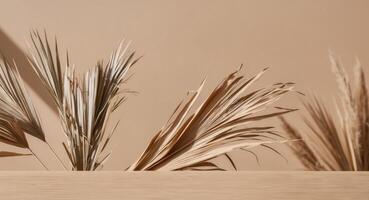 Dried Palm Leaves and Pampas Grass Border on Tan Background. photo