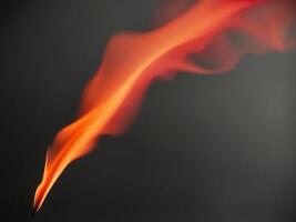 abstract fire flame shape rising on black background dynamic motion bright orange red colors vertical format. photo