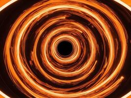 Abstract glowing orange vortex tunnel with swirling lights. photo