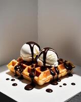 Indulgent waffles topped with ice cream and chocolate drizzle for a sweet dessert treat. photo