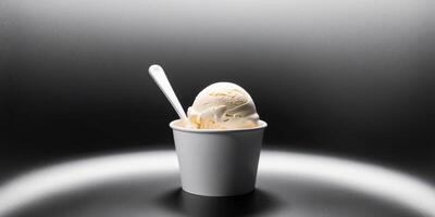 Ice cream scoop on white blank empty paper cup bowl on black background. photo