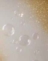 Enchanting Background of Floating Bubbles with Golden Glitter Effect. photo