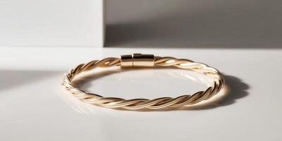 Discover the elegance of a golden twisted bracelet that enhances your style. photo