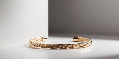 Discover the elegance of a golden twisted bracelet that enhances your style. photo