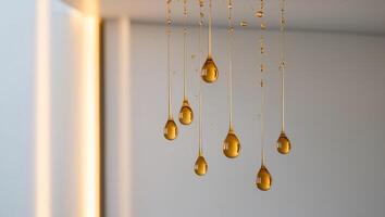 Golden droplets in motion perfect for luxury or health themes. photo