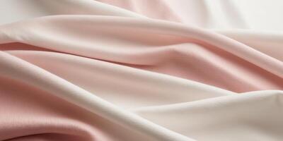 Pink and white fabric waves with a soft gradient of light. photo