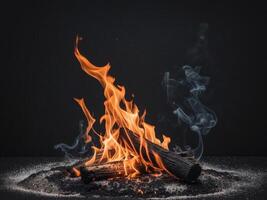 Fiery Flames and Smoldering Ashes on Dark Ground Background. photo