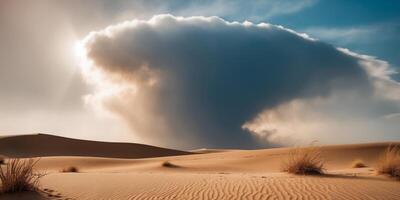 Sunlight breaks through a dark cloud over a desert sand dune. photo