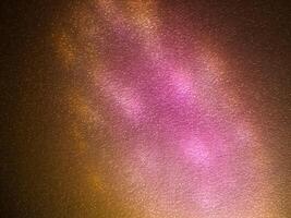 Pink reflection on foam sheet at night in the dark for abstract mysterious background. photo