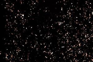 Blurry garland lights on a dark background. Festive Christmas and New Year background. Soft focus. Image toned in color of 2025 year - Mocha Mousse photo