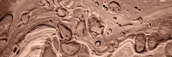 The texture of marble. Abstract background, made in the technique of fluid art. Demonstrating the colors of 2025 - Mocha Mousse photo