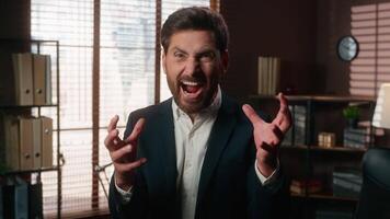 Portrait stressed irritated annoyed anger furious health problem mental stress Caucasian businessman office business man male guy employer angry mad shouting screaming yell shout scream yelling loud video