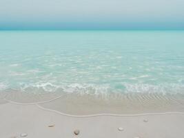 A beach with rocks and water in the ocean photo