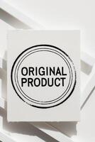 A white box with the word original product on it photo