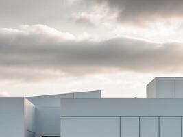 A building with white walls and a sky photo