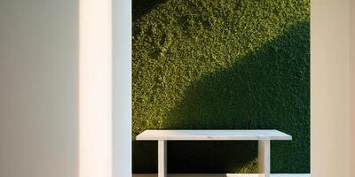 A table and a wall with green moss photo