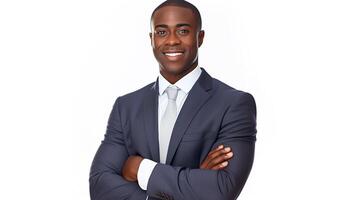 A black man in a suit and tie standing with his arms crossed photo