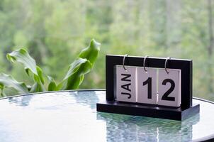 12 January calendar table with blurred nature background. With customizable space for text or ideas photo
