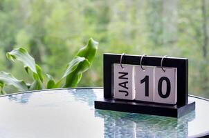 10 January calendar table with blurred nature background. With customizable space for text or ideas photo