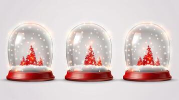 Three glass snow globes with trees inside photo