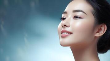 Beautiful asian woman with clean skin and makeup photo