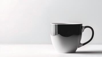 A white coffee cup on a white surface photo