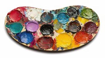 A palette of paint is shown on a white background photo