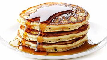 A stack of pancakes on a plate photo