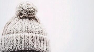 A knitted hat is shown on a white background photo