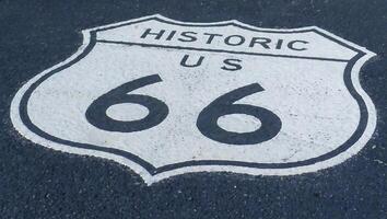 Historic Route 66 Road Sign on Asphalt Surface photo