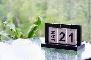21 January calendar table with blurred nature background. With customizable space for text or ideas photo