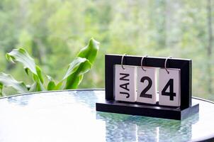 24 January calendar table with blurred nature background. With customizable space for text or ideas photo