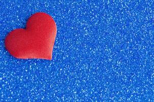 Top view of heart shape on blue cover wallpaper with customizable space for text photo