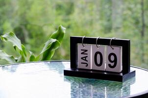 9 January calendar table with blurred nature background. With customizable space for text or ideas photo