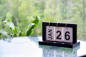 26 January calendar table with blurred nature background. With customizable space for text or ideas photo