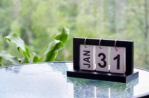 31 January calendar table with blurred nature background. With customizable space for text or ideas photo