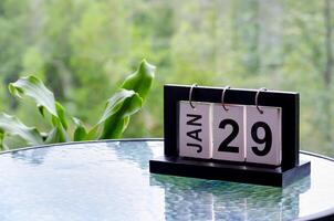 29 January calendar table with blurred nature background. With customizable space for text or ideas photo