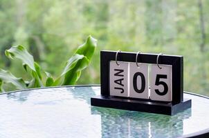 5 January calendar table with blurred nature background. With customizable space for text or ideas photo