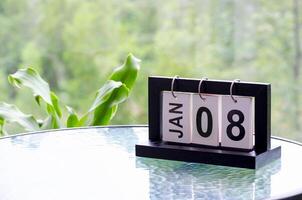 8 January calendar table with blurred nature background. With customizable space for text or ideas photo
