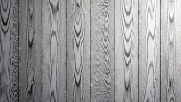 Gray wooden texture with vertical planks and unique grain pattern photo