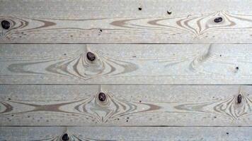 Rustic wooden planks with natural knots and unique grain patterns photo