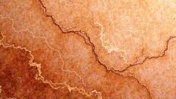 Abstract brown and beige marble texture with intricate veins photo