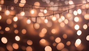 Warm glowing string lights with abstract bokeh background photo