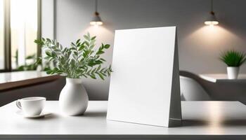 Minimalist white card and vase on table in modern cafe setting photo