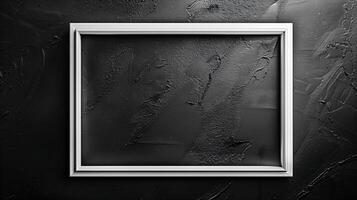 Empty White Frame Against Dark Textured Background for Display photo