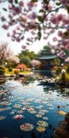 Tranquil garden with blooming cherry blossoms and serene pond filled with lily pads photo