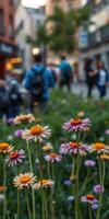 Vibrant flowers bloom in a bustling city park filled with visitors enjoying a pleasant day outdoors photo