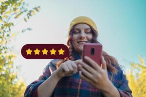 Customer Experience Concept. Excellent. Happy woman pressing face emoticon on virtual touch screen at smartphone .Customer service evaluation concept. photo